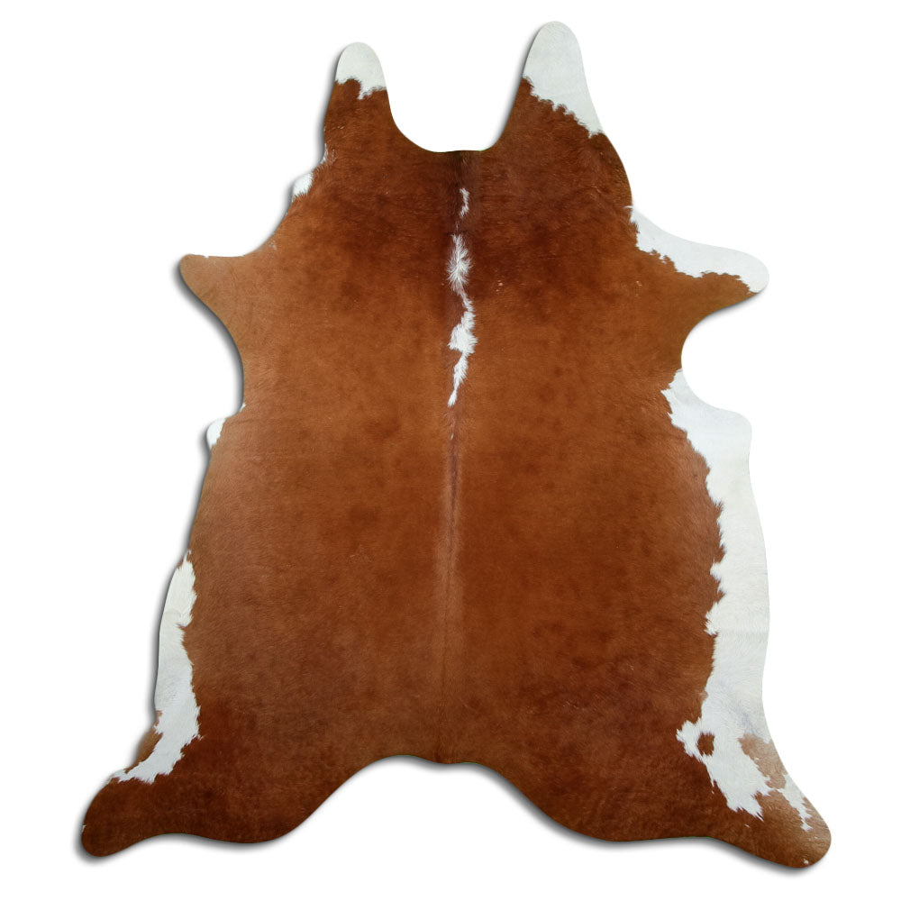 Peau de vache marron et blanc d’environ 220 × 200 cm, vue de dessus : exactement la peau que vous recevez