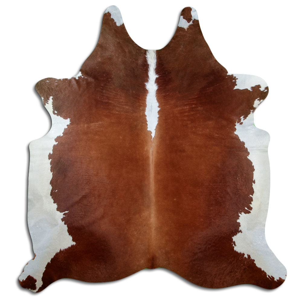 Peau de vache marron et blanc d’environ 220 × 200 cm, vue de dessus : exactement la peau que vous recevez