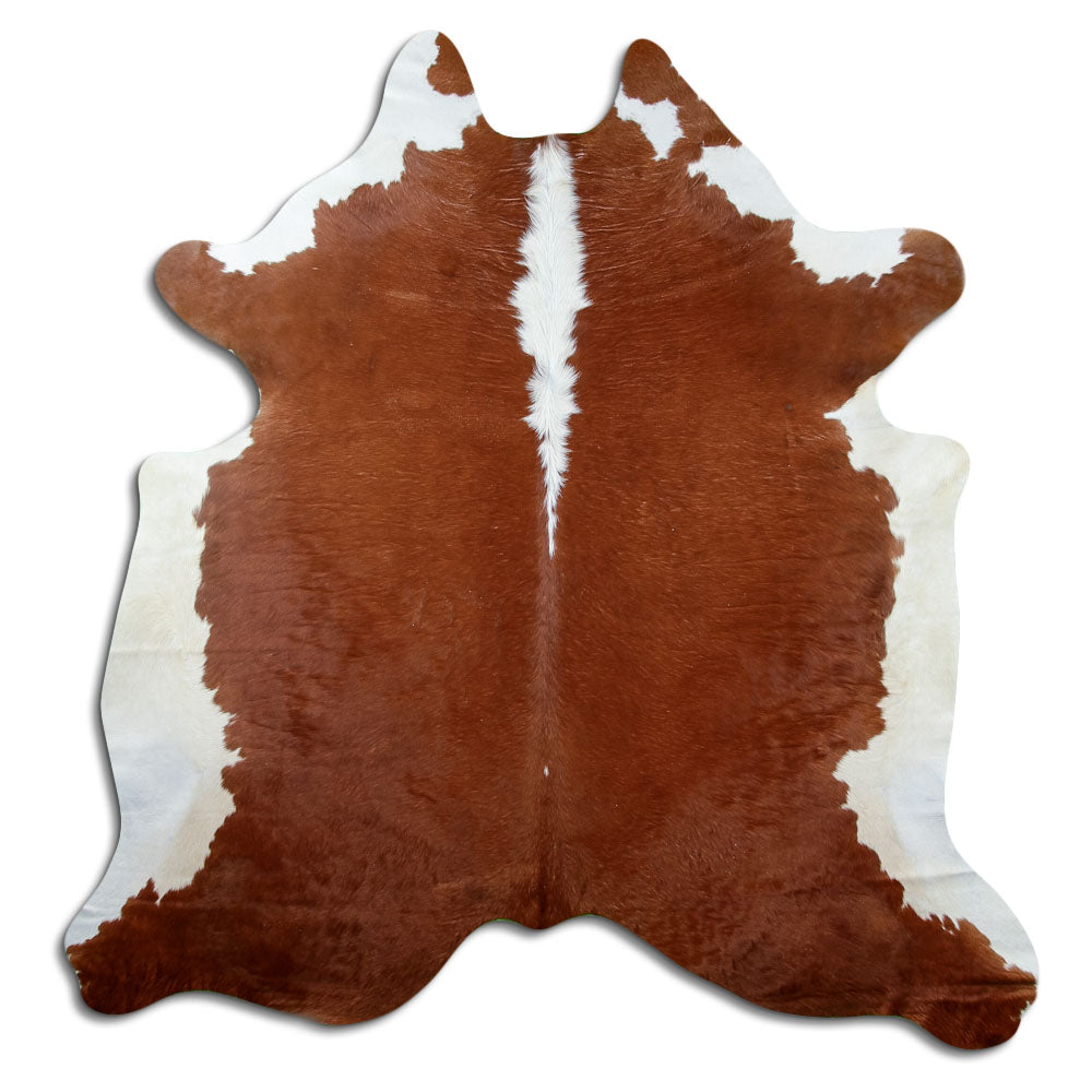 Peau de vache marron et blanc d’environ 210 × 200 cm, vue de dessus : exactement la peau que vous recevez