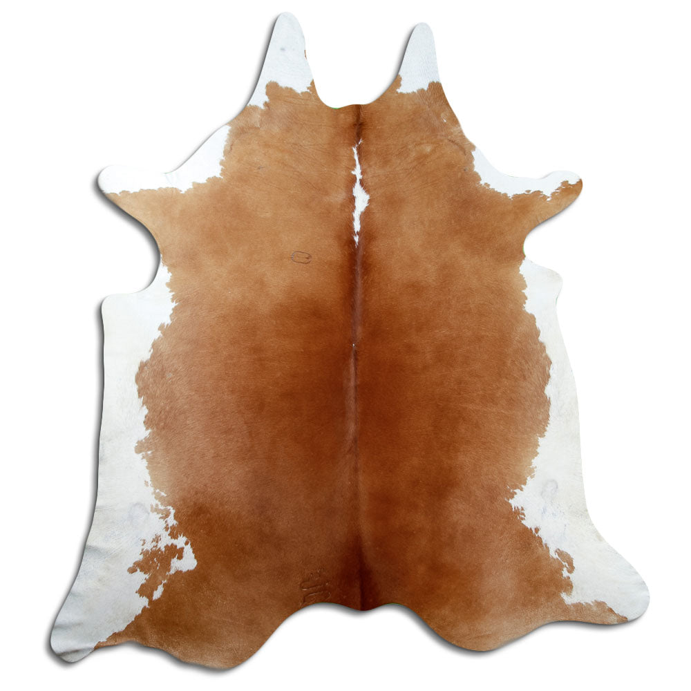 Peau de vache marron et blanc d’environ 230 × 210 cm, vue de dessus : exactement la peau que vous recevez