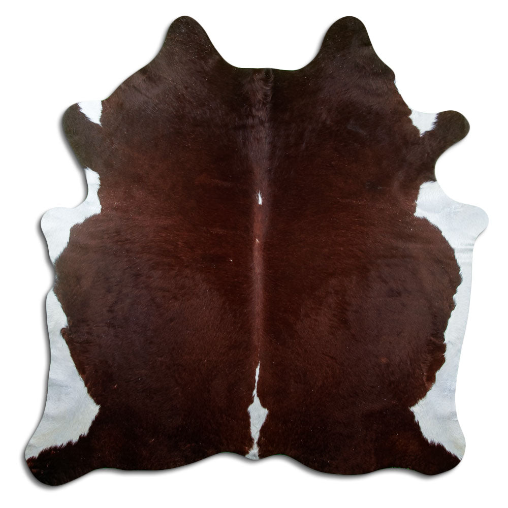 Peau de vache marron et blanc d’environ 210 × 200 cm, vue de dessus : exactement la peau que vous recevez