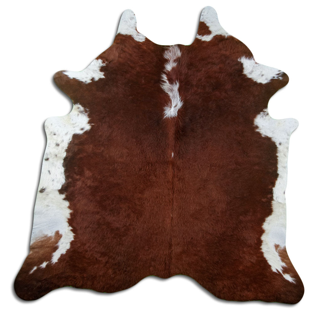 Peau de vache marron et blanc d’environ 200 × 200 cm, vue de dessus : exactement la peau que vous recevez