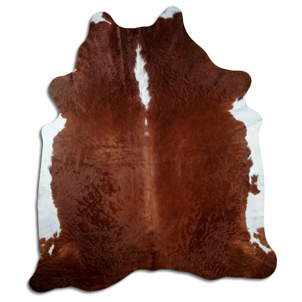 Peau de vache marron et blanc d’environ 240 × 210 cm, vue de dessus : exactement la peau que vous recevez