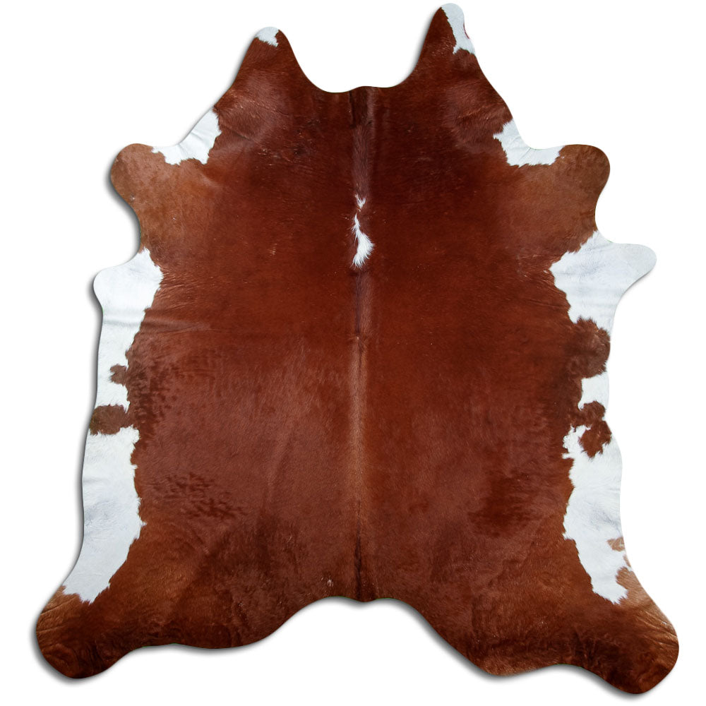 Peau de vache marron et blanc d’environ 230 × 220 cm, vue de dessus : exactement la peau que vous recevez