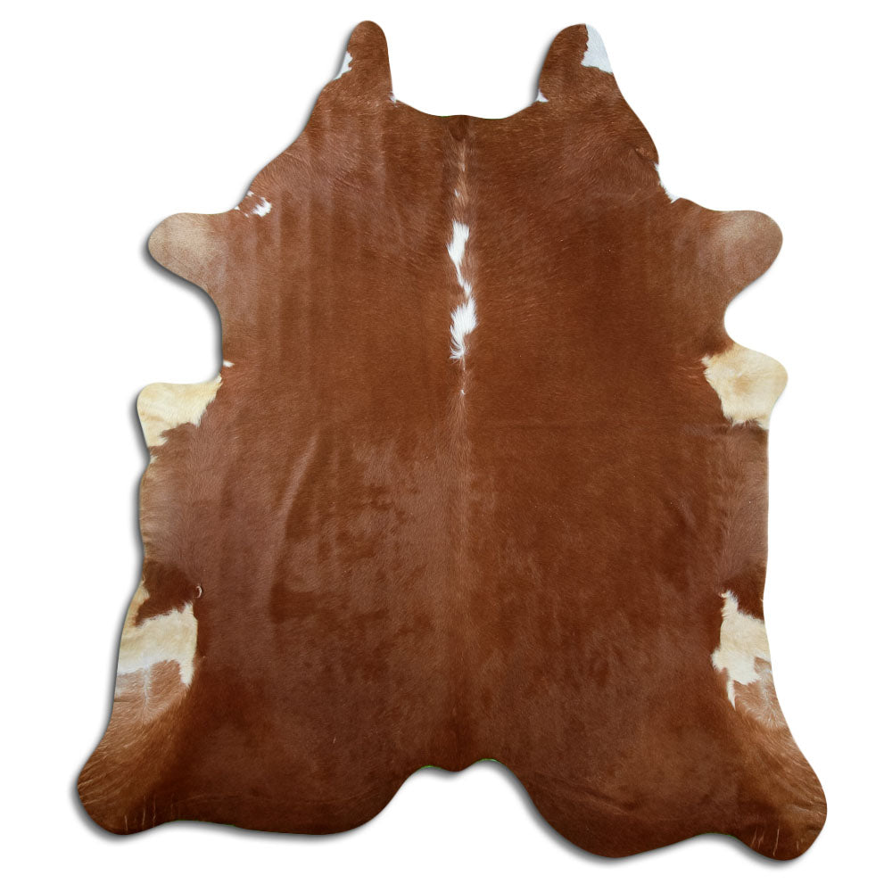 Peau de vache marron et blanc d’environ 230 × 210 cm, vue de dessus : exactement la peau que vous recevez