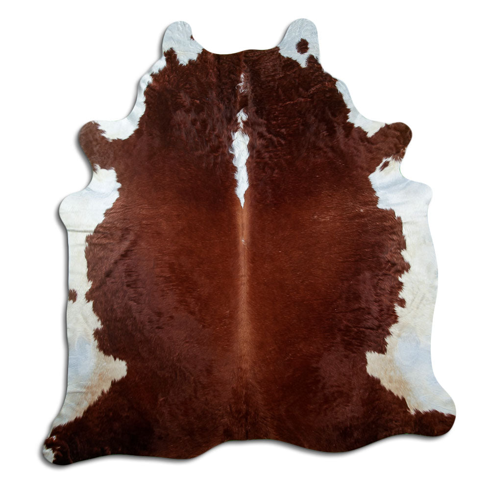 Peau de vache marron et blanc d’environ 220 × 200 cm, vue de dessus : exactement la peau que vous recevez