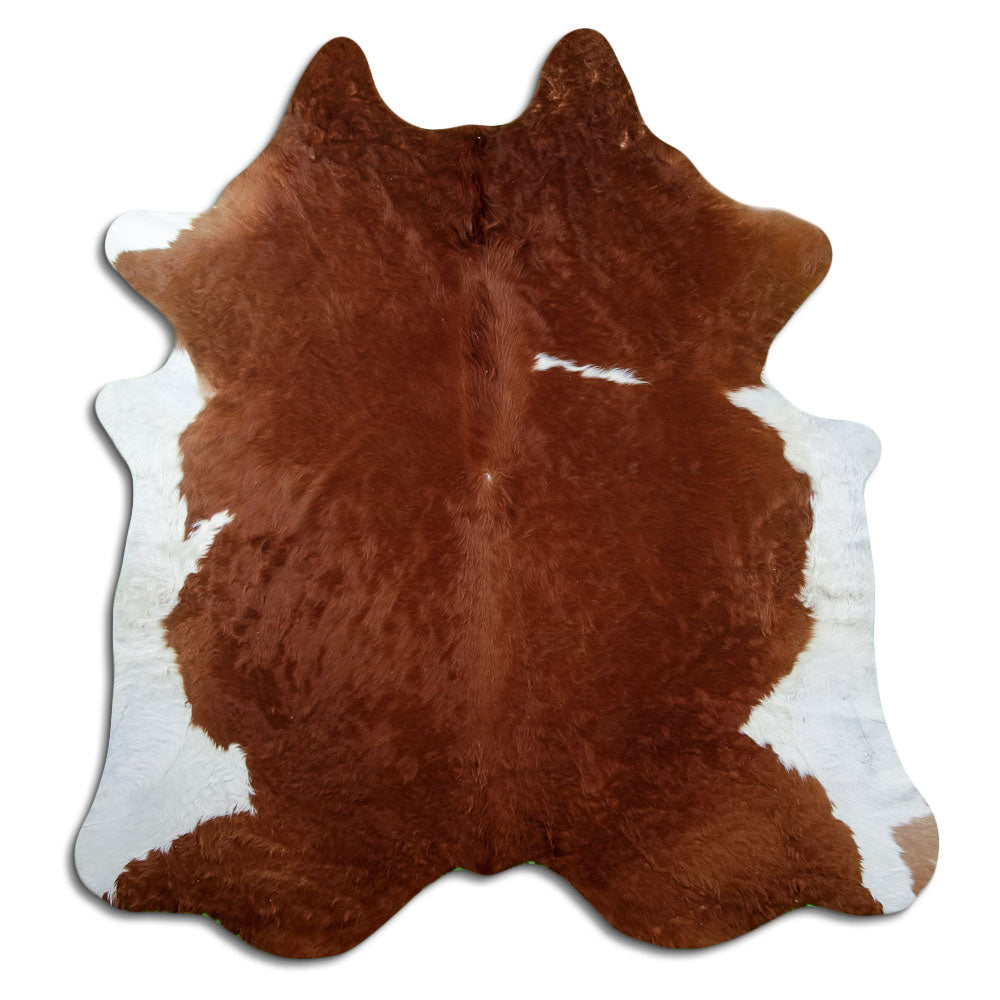Peau de vache marron et blanc d’environ 210 × 200 cm, vue de dessus : exactement la peau que vous recevez