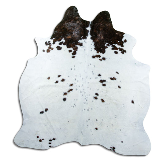 Peau de vache marron et blanc d’environ 180 × 170 cm, vue de dessus : exactement la peau que vous recevez