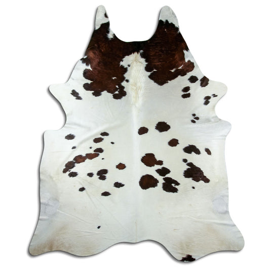 Peau de vache marron et blanc d’environ 250 × 210 cm, vue de dessus : exactement la peau que vous recevez