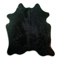 Peau de vache noire d’environ 180 × 160 cm, vue de dessus : exactement la peau que vous recevez