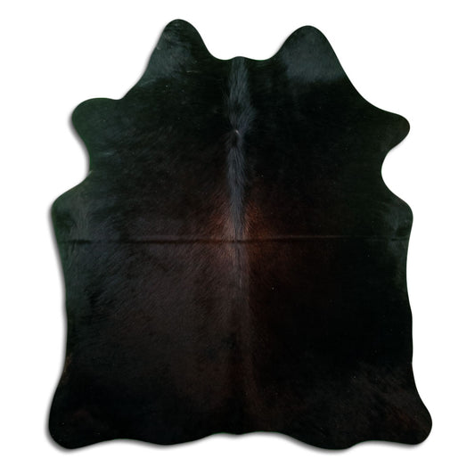 Peau de vache noire d’environ 170 × 150 cm, vue de dessus : exactement la peau que vous recevez