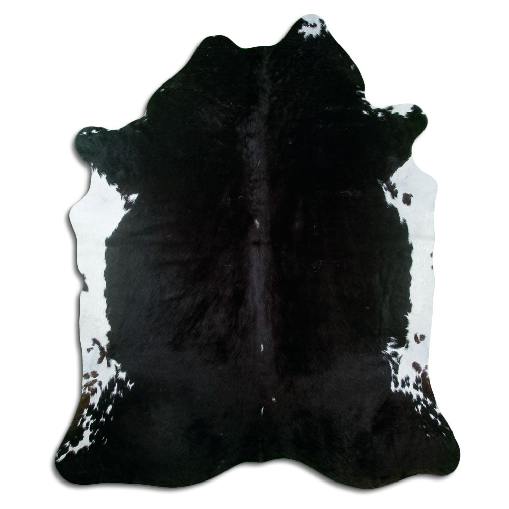 Peau de vache noire d’environ 210 × 180 cm, vue de dessus : exactement la peau que vous recevez