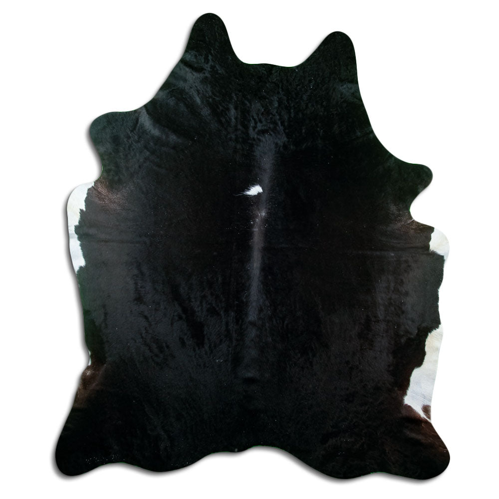 Peau de vache noire d’environ 220 × 190 cm, vue de dessus : exactement la peau que vous recevez