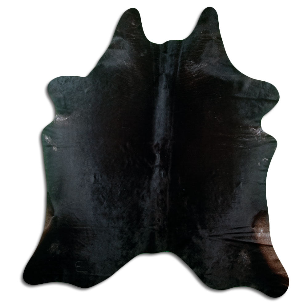 Peau de vache noire d’environ 220 × 200 cm, vue de dessus : exactement la peau que vous recevez