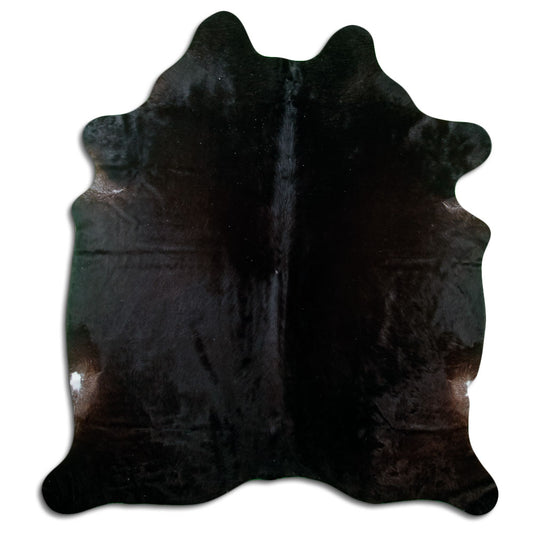 Peau de vache noire d’environ 200 × 180 cm, vue de dessus : exactement la peau que vous recevez