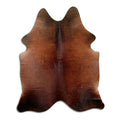 Peau de vache marron d’environ 200 × 160 cm, vue de dessus : exactement la peau que vous recevez