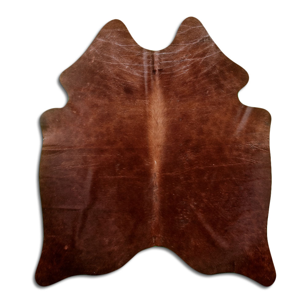 Peau de vache marron d’environ 170 × 150 cm, vue de dessus : exactement la peau que vous recevez