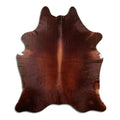Peau de vache marron d’environ 210 × 180 cm, vue de dessus : exactement la peau que vous recevez