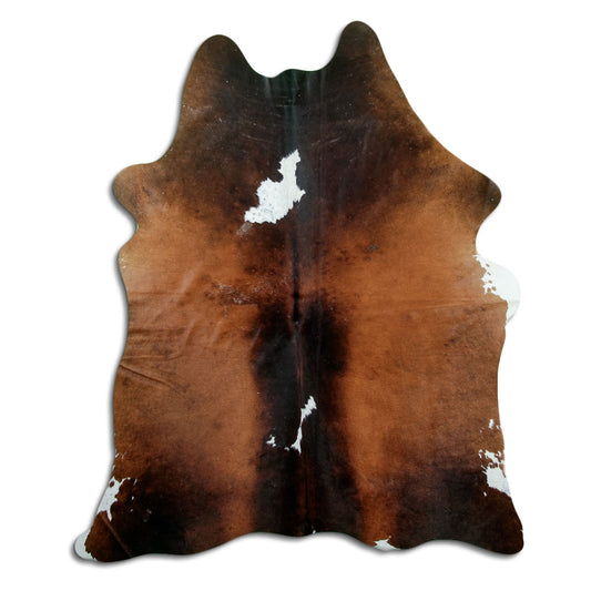 Peau de vache tricolore d’environ 200 × 160 cm, vue de dessus : exactement la peau que vous recevez