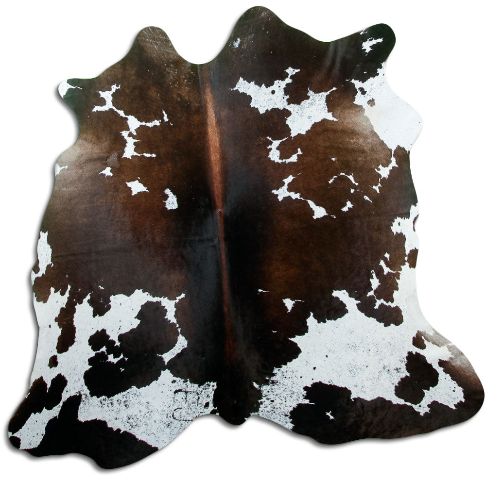 Peau de vache tricolore d’environ 170 × 180 cm, vue de dessus : exactement la peau que vous recevez