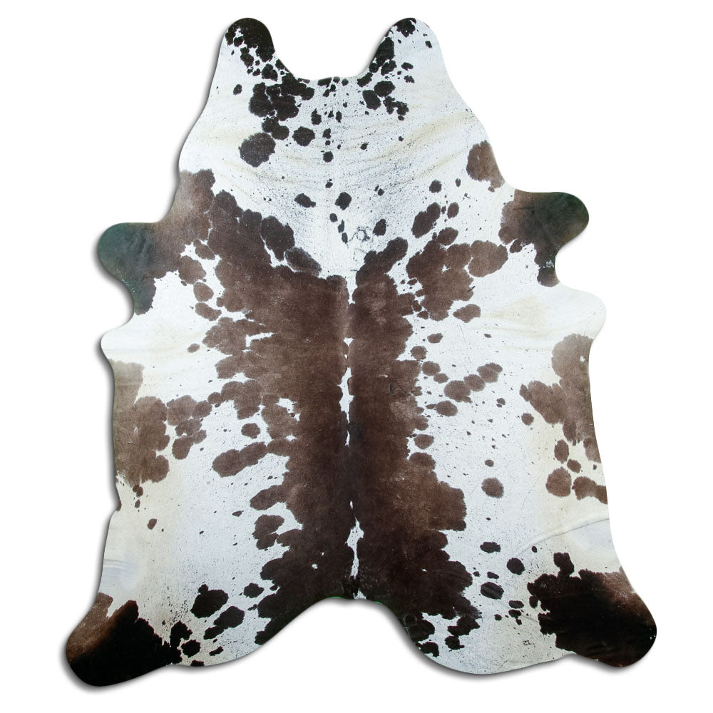 Peau de vache tricolore d’environ 240 × 210 cm, vue de dessus : exactement la peau que vous recevez