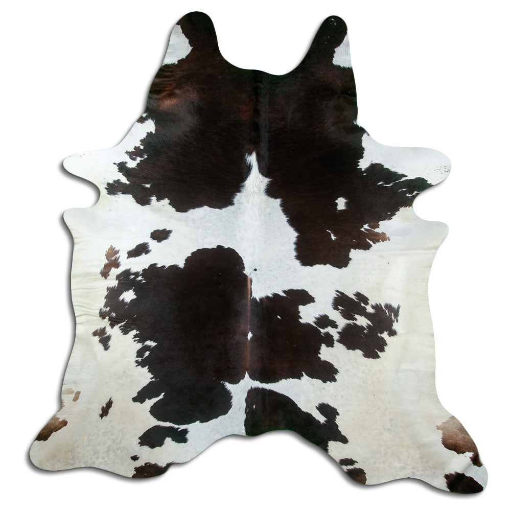 Peau de vache tricolore d’environ 230 × 220 cm, vue de dessus : exactement la peau que vous recevez