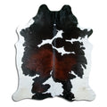 Peau de vache tricolore d’environ 220 × 190 cm, vue de dessus : exactement la peau que vous recevez