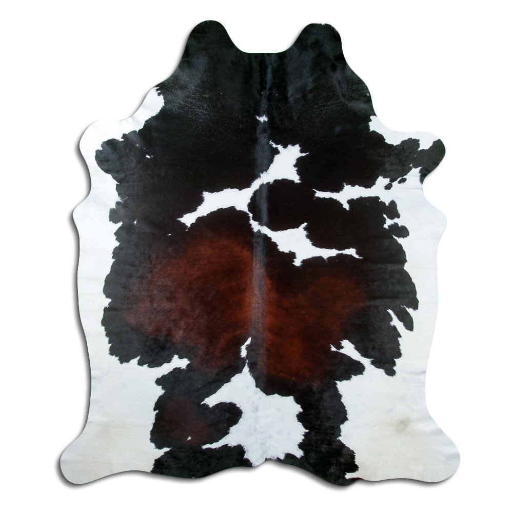 Peau de vache tricolore d’environ 220 × 190 cm, vue de dessus : exactement la peau que vous recevez