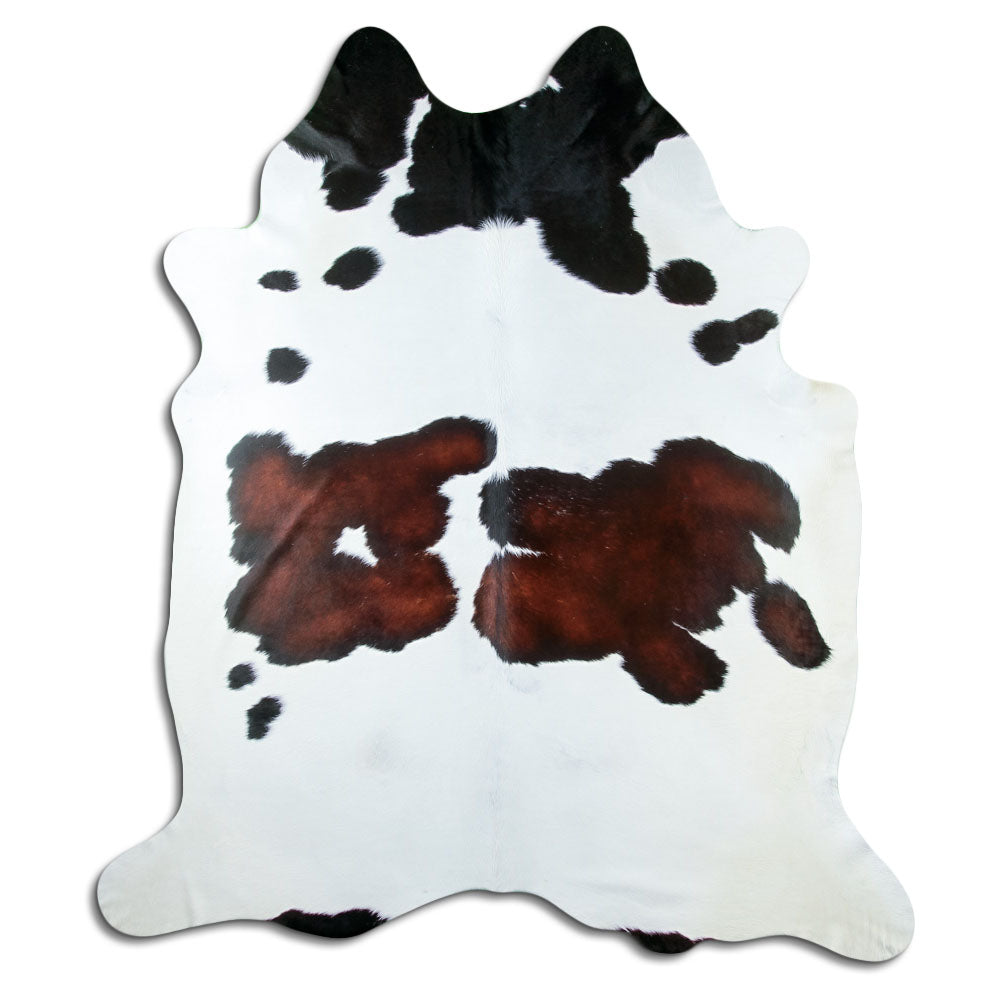 Peau de vache tricolore d’environ 250 × 220 cm, vue de dessus : exactement la peau que vous recevez
