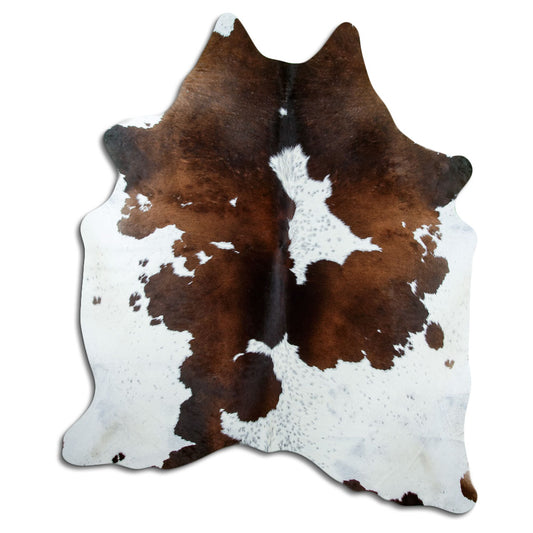 Peau de vache tricolore d’environ 220 × 190 cm, vue de dessus : exactement la peau que vous recevez