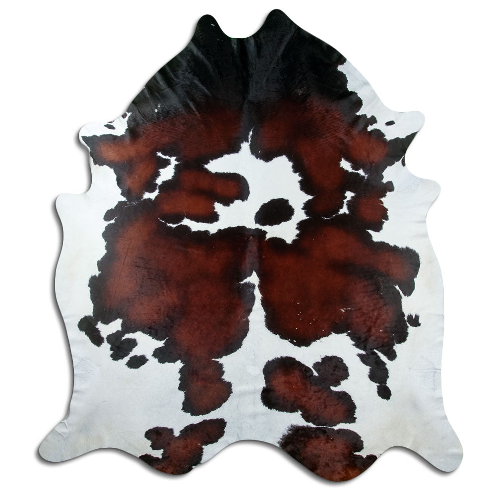 Peau de vache tricolore d’environ 250 × 220 cm, vue de dessus : exactement la peau que vous recevez