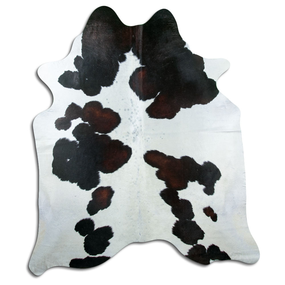 Peau de vache tricolore d’environ 220 × 190 cm, vue de dessus : exactement la peau que vous recevez