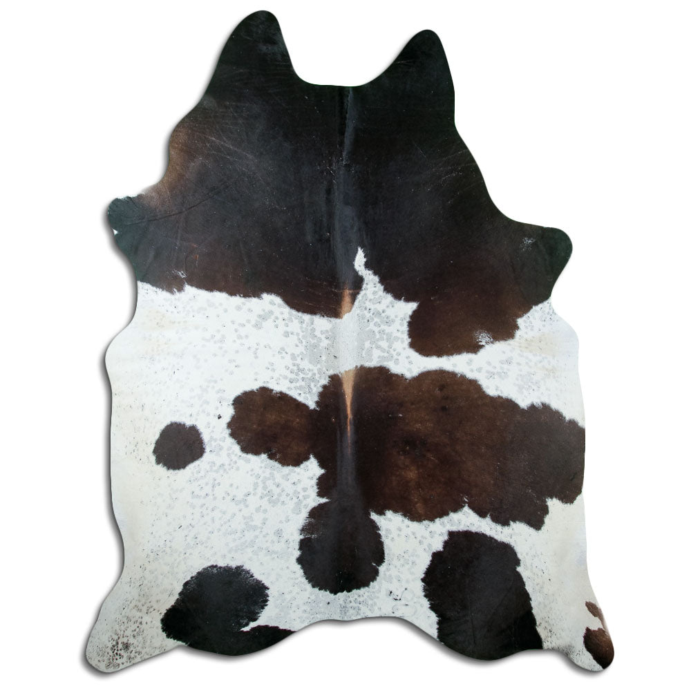 Peau de vache tricolore d’environ 230 × 190 cm, vue de dessus : exactement la peau que vous recevez