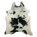 Peau de vache noire et blanche XL