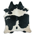 Peau de vache noire et blanche XL