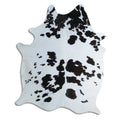 Peau de vache noire et blanche XL