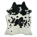 Peau de vache noire et blanche XL