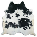Peau de vache noire et blanche L