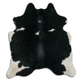 Peau de vache noire et blanche M