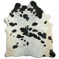 Peau de vache noire et blanche XL
