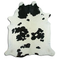 Peau de vache noire et blanche XL