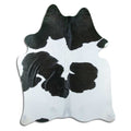 Peau de vache noire et blanche XL