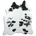 Peau de vache noire et blanche XL