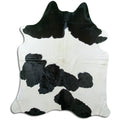 Peau de vache noire et blanche XL