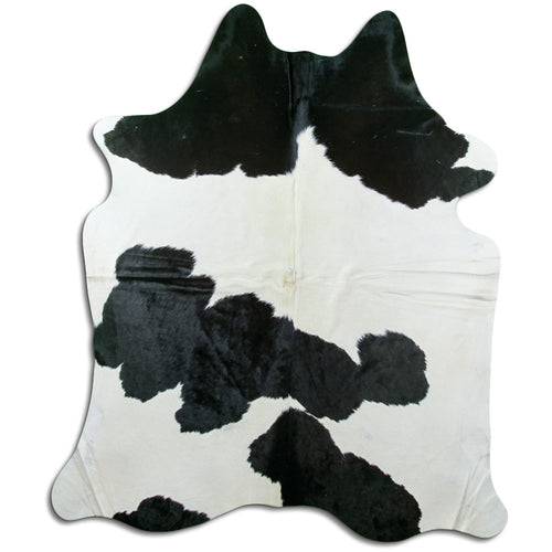 Peau de vache noire et blanche XL