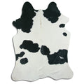 Peau de vache noire et blanche L