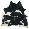 Peau de vache noire et blanche M