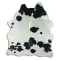 Peau de vache noire et blanche M