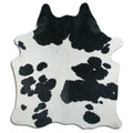 Peau de vache noire et blanche XL