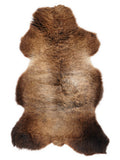 Peau de mouton marron d’environ 115 × 50 cm, vue de dessus : exactement la peau que vous recevez